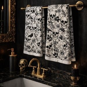 New without tags Tahari Home skull print cotton hand towels.